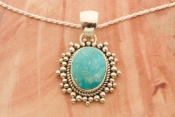 Artie Yellowhorse Genuine Emerald Valley Turquoise Rising Sun Pendant